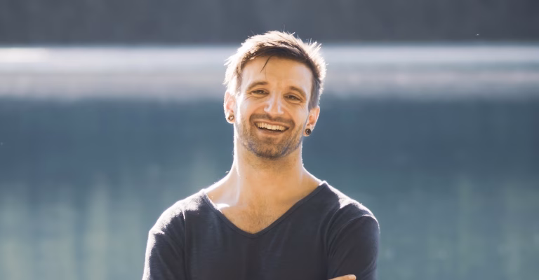 Christopher Shewchuk smiling outdoors